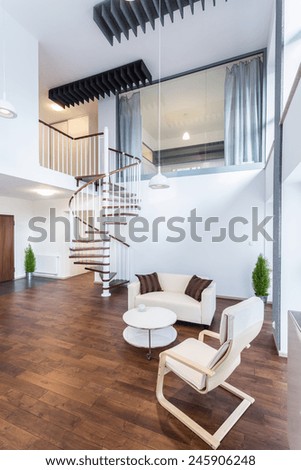 Fancy curly stairs in new elegant apartment