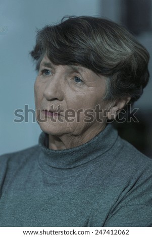 Portrait of older unhappy woman with depression