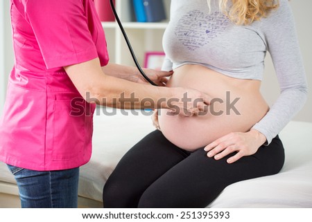 Close-up of pregnant woman on routine medical supervision