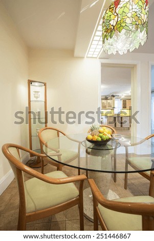 Dining room inside classic style house, vertical