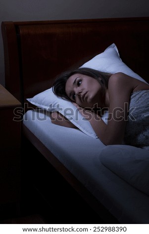 View of woman cannot sleep at night