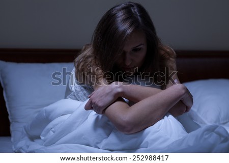 View of awake woman suffering from depression