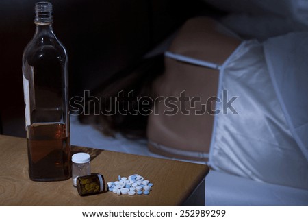 Woman addicted to drugs and alcohol, horizontal