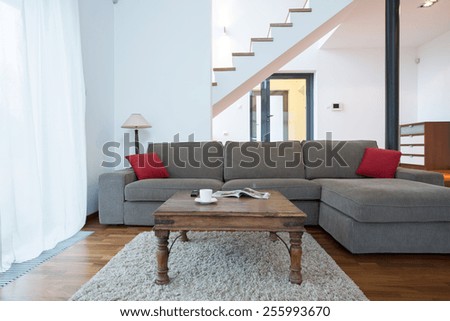 Large couch in living room in the residence