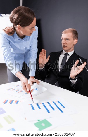 Image of angry manager and innocent employee