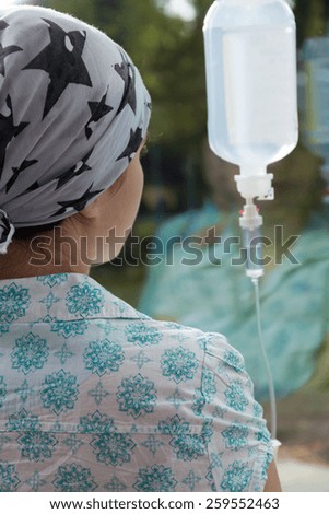 Back of cancer woman having intravenous therapy