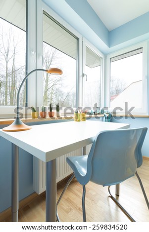 Children study space with white desk and blue chair