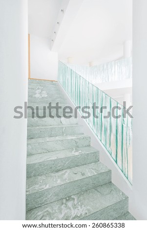 View of marble stairs in bright house