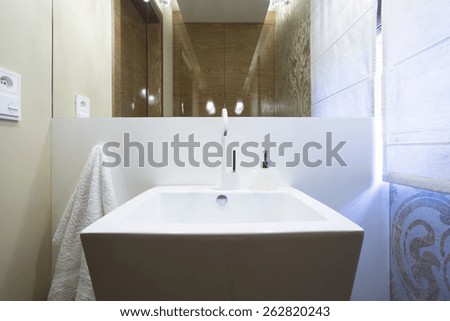 Big square porcelain basin in luxury bathroom