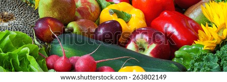 Color fruits and vegetables mixed together - panorama