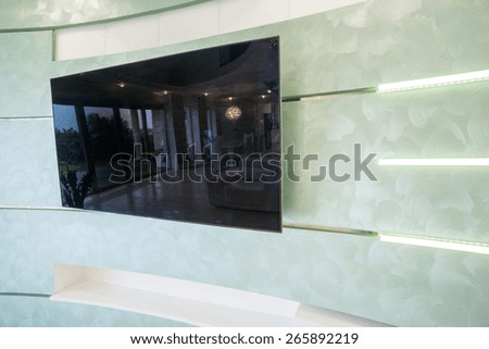 Tv on the wall inside modern interior