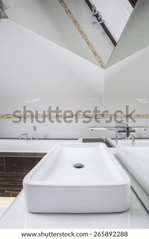 Interior of bathroom in the attic, vertical