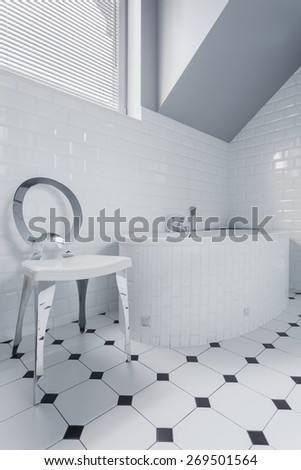 Clean white bathroom in contemporary detached house