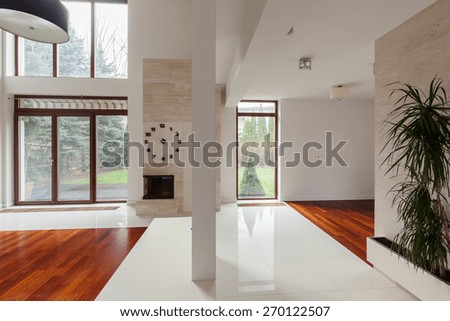 Up-to-date fancy design of new spacious living room