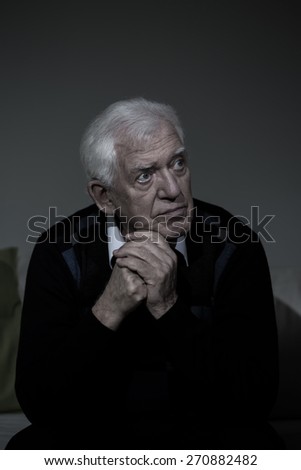 Portrait of older lonely man with depression