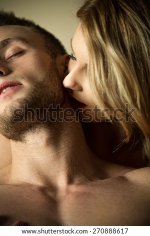 Beauty woman kissing neck of her lover