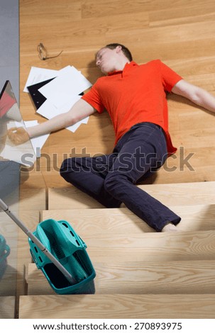 Young unconscious man having a dangerous accident