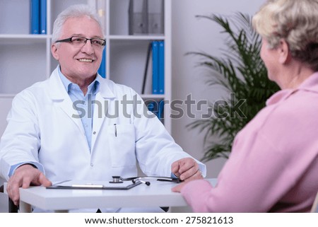 Elder woman having medical consultation in doctor\'s office