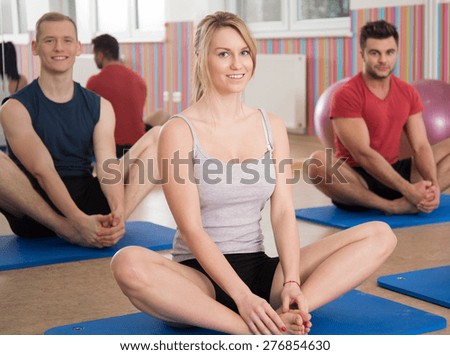 Yoga instructor showing exercise during yoga classes
