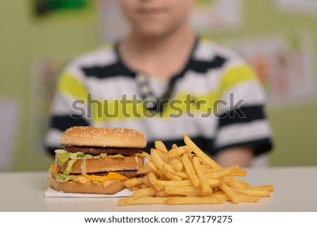 Hamburger and french fries for unhealthy lunch