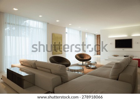 Enormous comfortable sofa in cozy main room