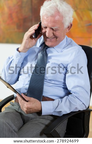 View of elder man talking on phone