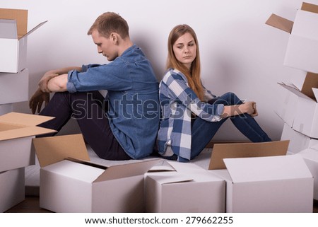 Horizontal view of couple arguing during relocation