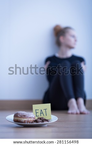 Image of young anorexic girl refusing to eat