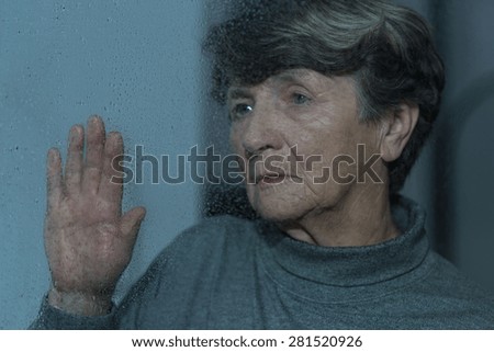 Old women feels lonely, unhappy and depressed
