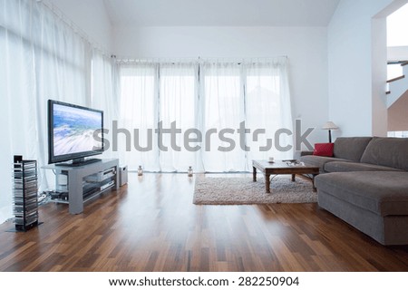 Plasma television in drawing room in modern house