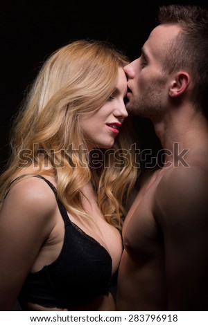 Passionate young couple in a loving embrace