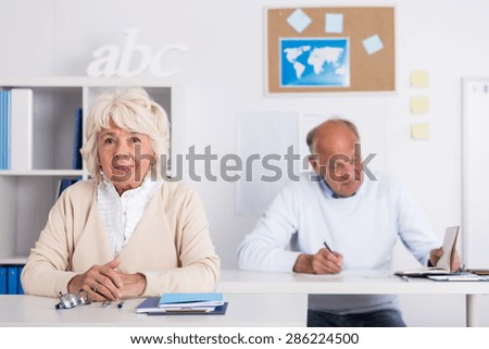 Image of senior students sitting at the desk