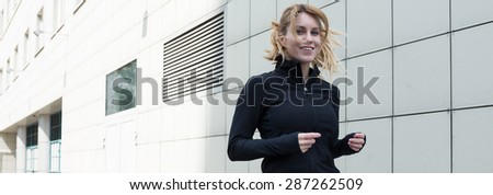 Young woman is happy when she runs