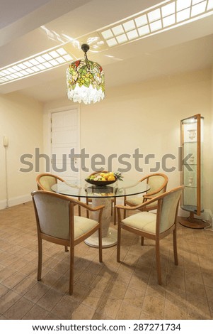 Elegant dining room interior with circular table