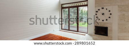 Horizontal view of contemporary detached house - panorama