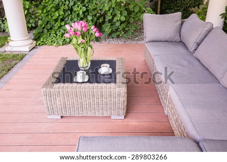 Beauty summer house with wicker garden furniture