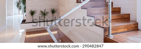 Close-up of wooden steps leading on the first floor
