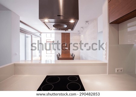 Marble white wheat with electric hob and silver hood