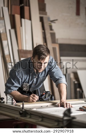 Image of young woodworker working in carpentry