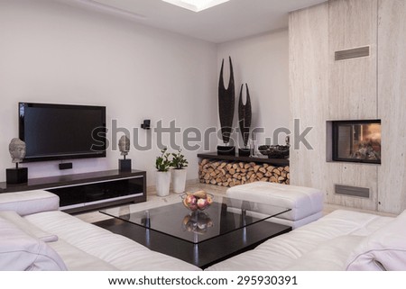 Sitting room with plasma TV and fireplace