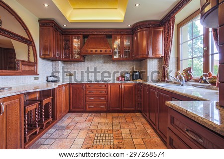 Wooden kitchen unit in colonial style interior