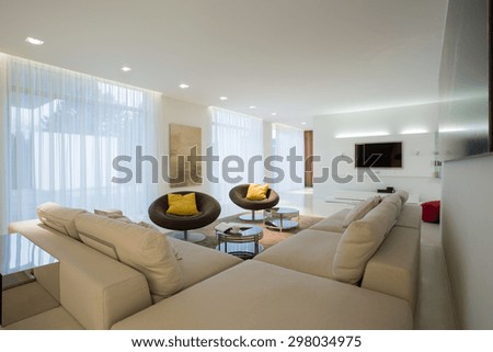 Comfortable corner sofa in contemporary drawing room