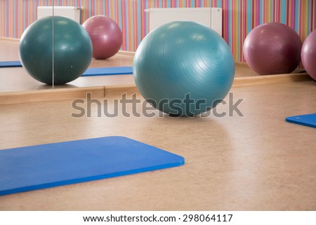 Interior of pilates room with equipment, horizontal