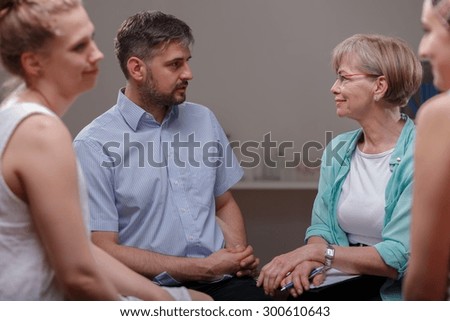 Photo of patients talking with psychologist about their problems