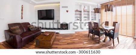Panoramic picture of exclusive living room in house