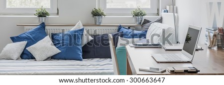 Panorama of study and sleeping room combination in modern flat