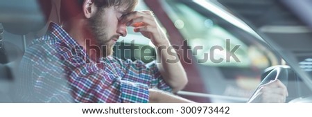Young driver is depressed because of his problems