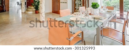 Modern chairs and table in a dining room
