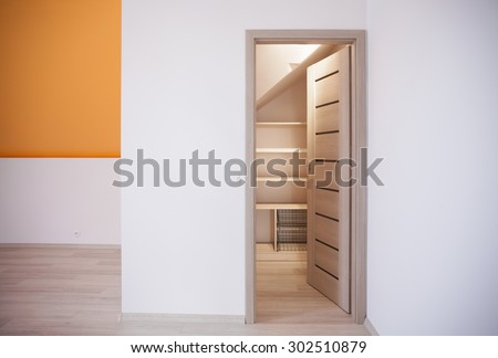 Storage idea for attic bedroom closet in home