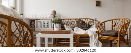 Panoramic view of wicker sofa set in new lounge
